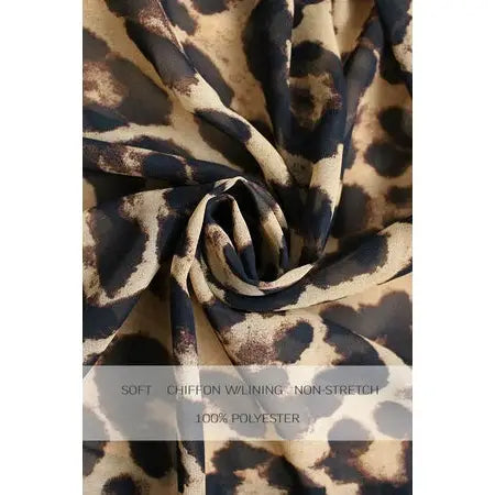 Wild Charm Ruffle Romper